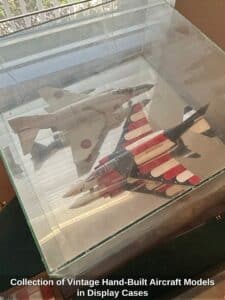 Collection-of-Vintage-Hand-Built-Aircraft-Models-in-Display-Cases-second-image