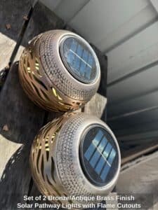 Set-of-Bronze-or-Antique-Brass-Finish-Solar-Pathway-Lights-with-Flame-Cutouts
