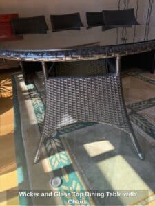 Wicker-and-Glass-Top-Dining-Table-with-Chairs