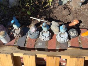 Assorted-Garden-Statuary-Collection-Rabbits-Squirrels-Gnomes-Angels-and-Girl-on-Pedestal-third-image