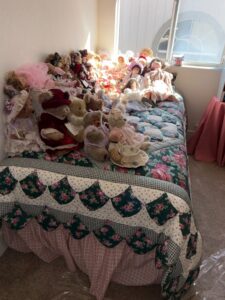 Collection-of-Porcelain-Dolls-and-Teddy-Bears