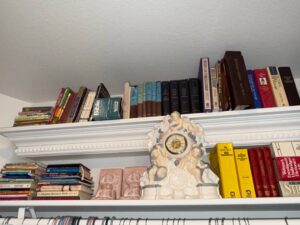 Collection-of-Religious-Books-and-Decorative-Cherub-Clock
