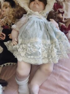 Porcelain-Doll-with-Lace-Dress-and-Bonnet