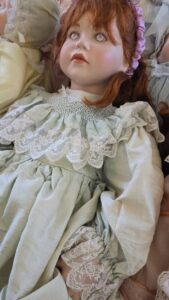 Porcelain-Doll-with-Red-Hair-and-Blue-Dress-second-image