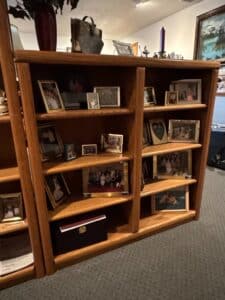 Oak-Bookcase-with-Framed-Photographs