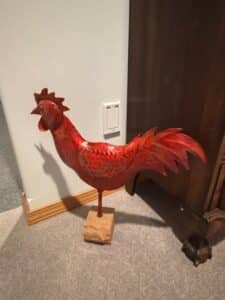 Red-Metal-Rooster-Sculpture-with-Wooden-Base