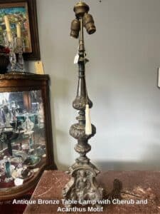 Antique-Bronze-Table-Lamp-with-Cherub-and-Acanthus-Motif
