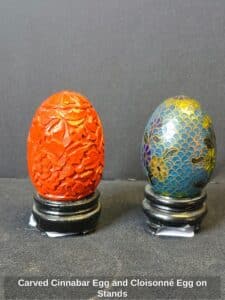 Carved-Cinnabar-Egg-and-Cloisonn-Egg-on-Stands