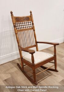 Antique-Oak-Stick-and-Ball-Spindle-Rocking-Chair-with-Carved-Panel-second-image