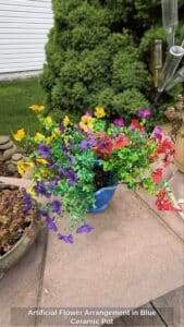 Artificial-Flower-Arrangement-in-Blue-Ceramic-Pot