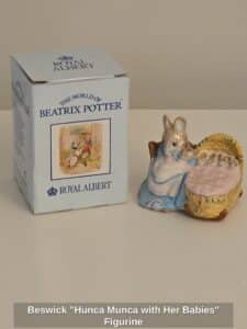 Beswick-Hunca-Munca-with-Her-Babies-Figurine