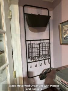 Black-Metal-Wall-Organizer-with-Planter-and-Baskets
