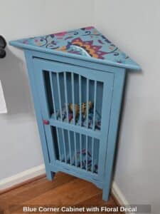 Blue-Corner-Cabinet-with-Floral-Decal