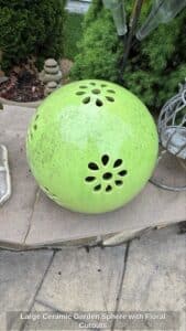 Large-Ceramic-Garden-Sphere-with-Floral-Cutouts