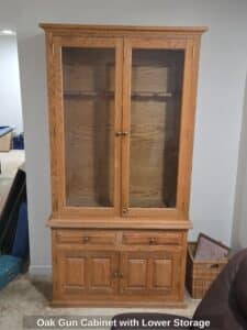 Oak-Gun-Cabinet-with-Lower-Storage