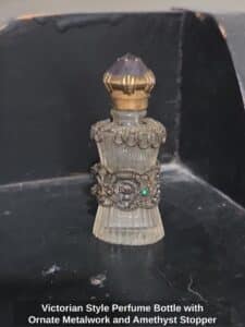 Victorian-Style-Perfume-Bottle-with-Ornate-Metalwork-and-Amethyst-Stopper