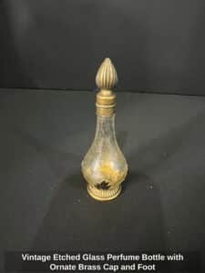 Vintage-Etched-Glass-Perfume-Bottle-with-Ornate-Brass-Cap-and-Foot
