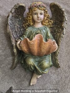 Angel-Holding-a-Seashell-Figurine