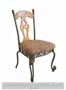 Glass-Top-Dining-Table-with-Four-Ornate-Metal-Chairs-second-image