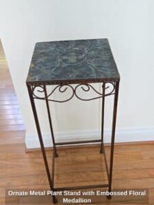 Ornate-Metal-Plant-Stand-with-Embossed-Floral-Medallion