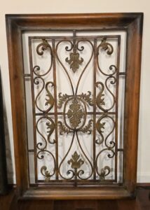 Ornate-Scrollwork-Metal-Panel-with-Wooden-Frame