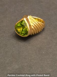 Peridot-Cocktail-Ring-with-Fluted-Band