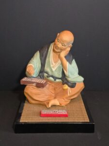 A.-Sato-Old-Man-with-Abacus-Hakata-Doll-Figurine