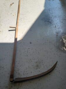 Antique-Scythe-with-Wooden-Handle