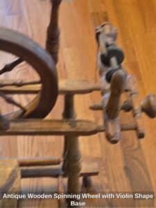 Antique-Wooden-Spinning-Wheel-with-Violin-Shape-Base-second-image