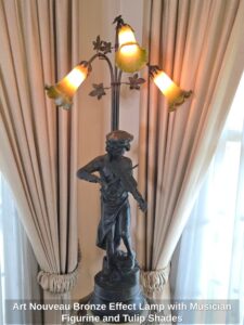 Art-Nouveau-Bronze-Effect-Lamp-with-Musician-Figurine-and-Tulip-Shades