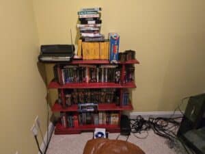 Assorted-VHS-Tapes-DVDs-and-Board-Games