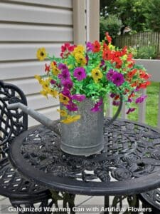 Galvanized-Watering-Can-with-Artificial-Flowers