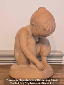 Terracotta-Sculpture-of-a-Crouching-Child-Seated-Boy-by-Museum-Pieces-Inc