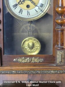 Victorian-E.N.-Welch-Walnut-Mantel-Clock-with-Lion-Motif-fourth-image