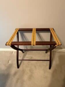 Vintage-Wooden-Luggage-Rack-with-Geometric-Woven-Straps
