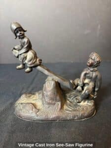 Vintage-Cast-Iron-See-Saw-Figurine