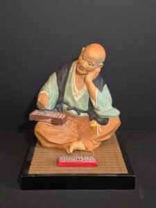 A.-Sato-Old-Man-with-Abacus-Hakata-Doll-Figurine