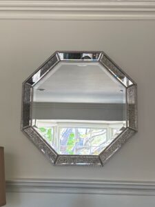 Octagonal-Mirror-with-Beveled-Glass-and-Mirrored-Segment-Frame-with-Beaded-Border