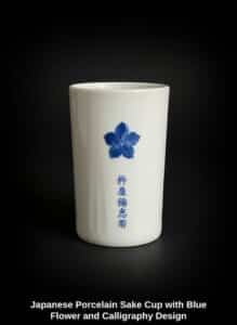 Japanese-Porcelain-Sake-Cup-with-Blue-Flower-and-Calligraphy-Design