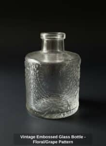 Vintage-Embossed-Glass-Bottle-Floral-or-Grape-Pattern-second-image