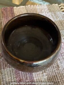 pottery-bowl-with-deep-brown-glaze-third-image