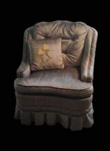 Vintage-Tufted-Upholstered-Armchair-with-Floral-Pillow