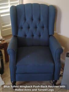 Blue-Tufted-Wingback-Push-Back-Recliner-with-Rolled-Arms-and-Turned-Legs