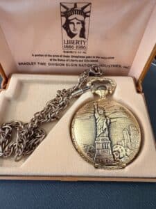 Statue-of-Liberty-Centennial-Commemorative-Pocket-Watch-by-Bradley-Time-Division
