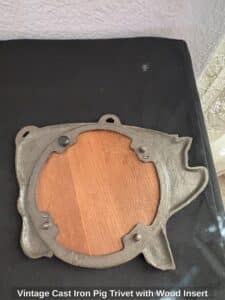 Vintage-Cast-Iron-Pig-Trivet-with-Wood-Insert-third-image