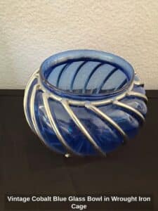 Vintage-Cobalt-Blue-Glass-Bowl-in-Wrought-Iron-Cage