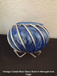 Vintage-Cobalt-Blue-Glass-Bowl-in-Wrought-Iron-Cage-second-image