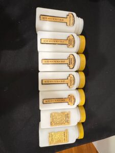 Vintage-Griffiths-Milk-Glass-Spice-Jar-Set-with-Yellow-Lids