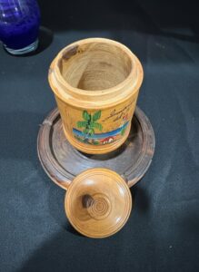 Vintage-Jamaican-Hand-Painted-Wooden-Lidded-Jar-and-Ashtray-Set-second-image