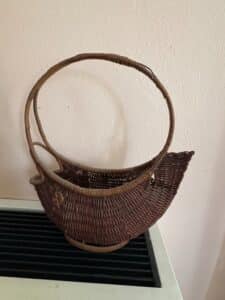Vintage-Woven-Wicker-Cradle-Basket-with-Arched-Handle-second-image